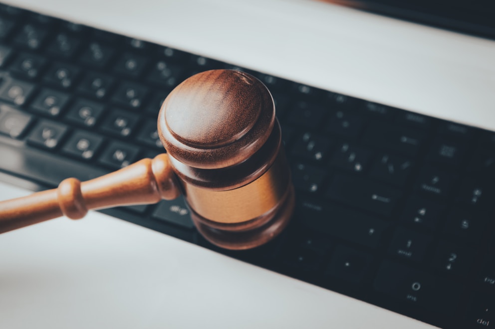 Gavel and keyboard representing legal compliance